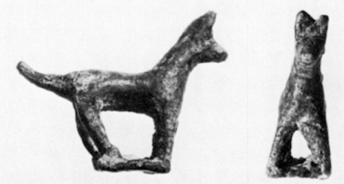 ND 3209. Copper or bronze figurine of a dog, discovered with six others down a well at the S. end of room NN of the N.W. Palace at Nimrud. Left ear chipped, and tip of tail broken in antiquity. Previously unpublished: see J.E. Curtis, Dissertation, II; Cf. also Mallowan, ILN 1952; Iraq 15 (1953); N&R I, 103. Plate XIVe. 
